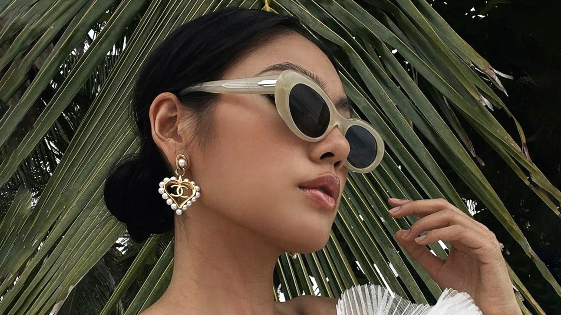 Image may contain Body Part Face Head Neck Person Accessories Glasses Adult Wedding Sunglasses and Earring